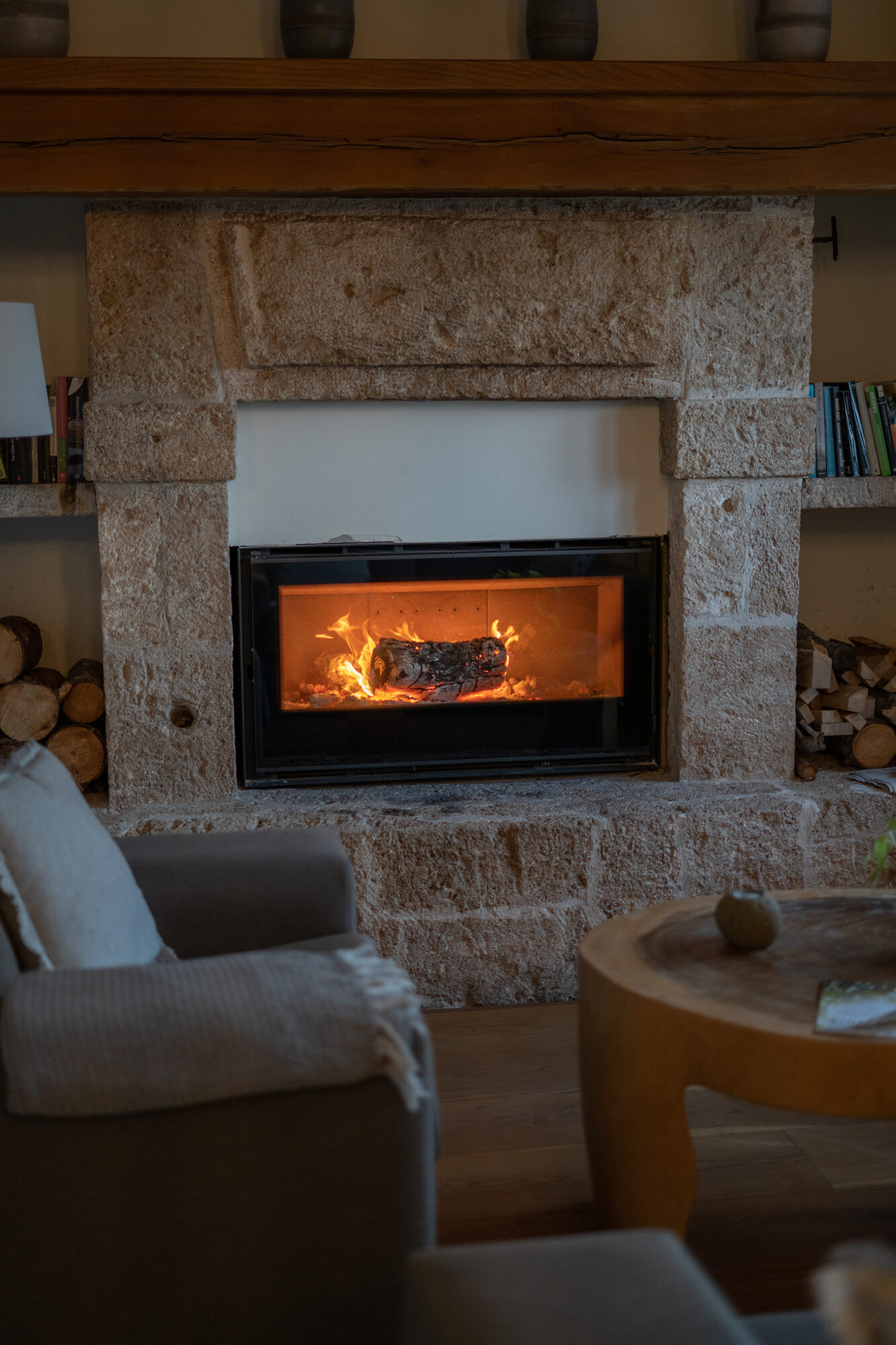 Stone fireplace in lounge